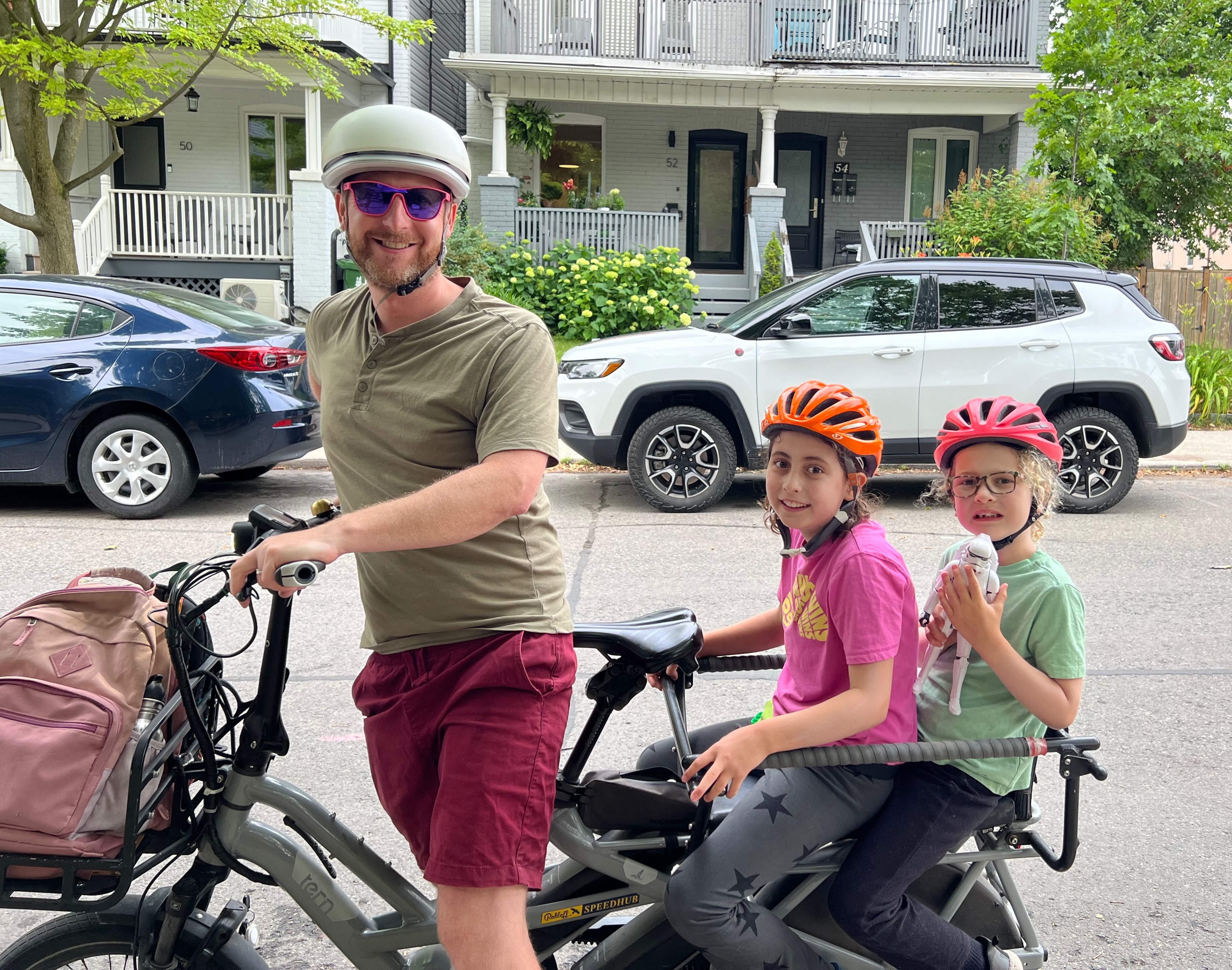 Greg and his kids on a cargo bike in Toronto's east end